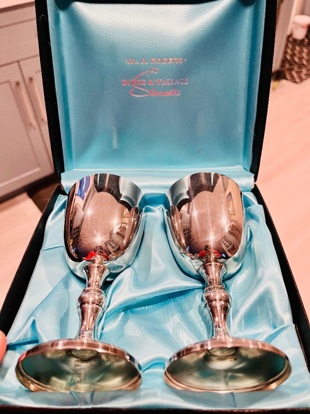 A pair of silver plated goblets